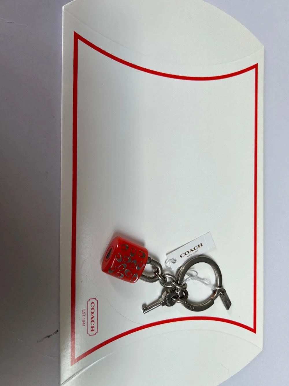 COACH LOCK AND KEY KEY RING  PURSE CHARM PINK AND SILVER NEW NWT (RETIRED) W/BOX